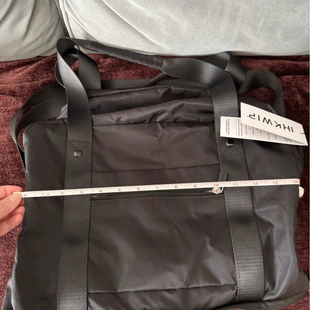 IHKWIP brand black duffle bag with small cosmetic bag.   NWT - Picture 8 of 15